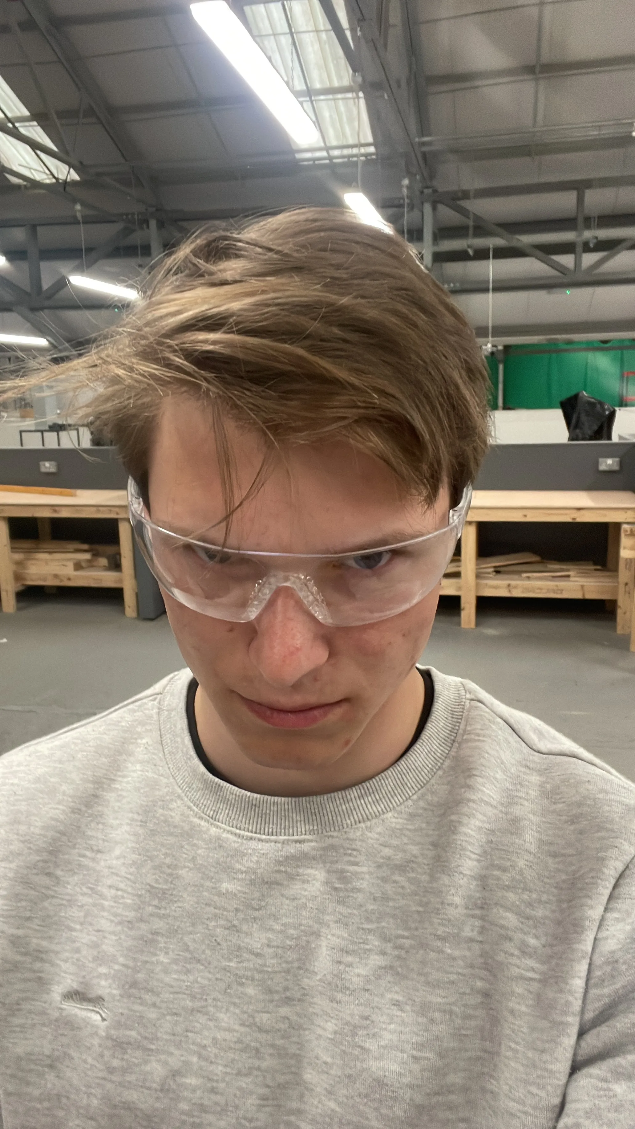 Wearing clear safety glasses in a workshop